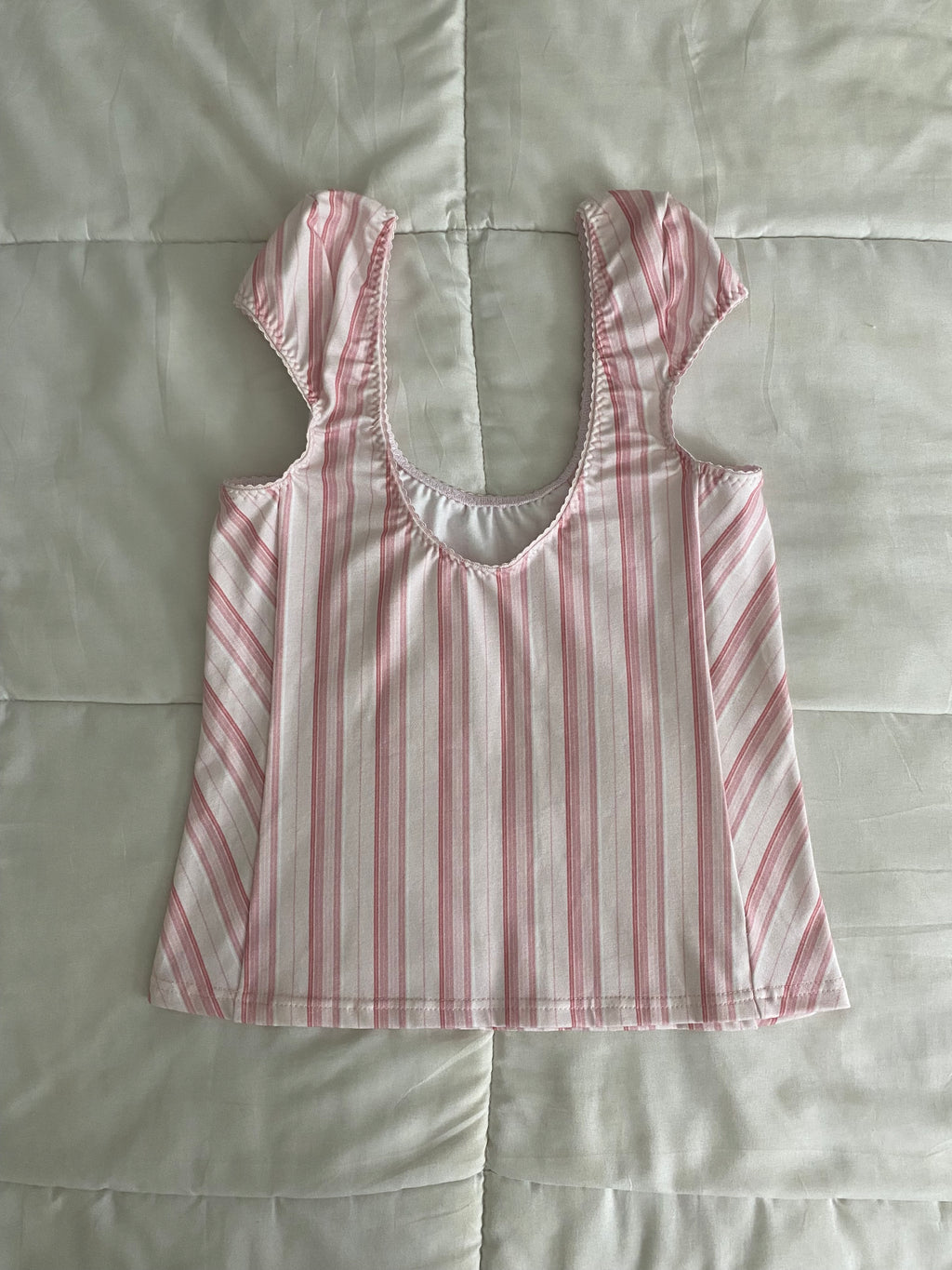 pink & white striped top with pink trim